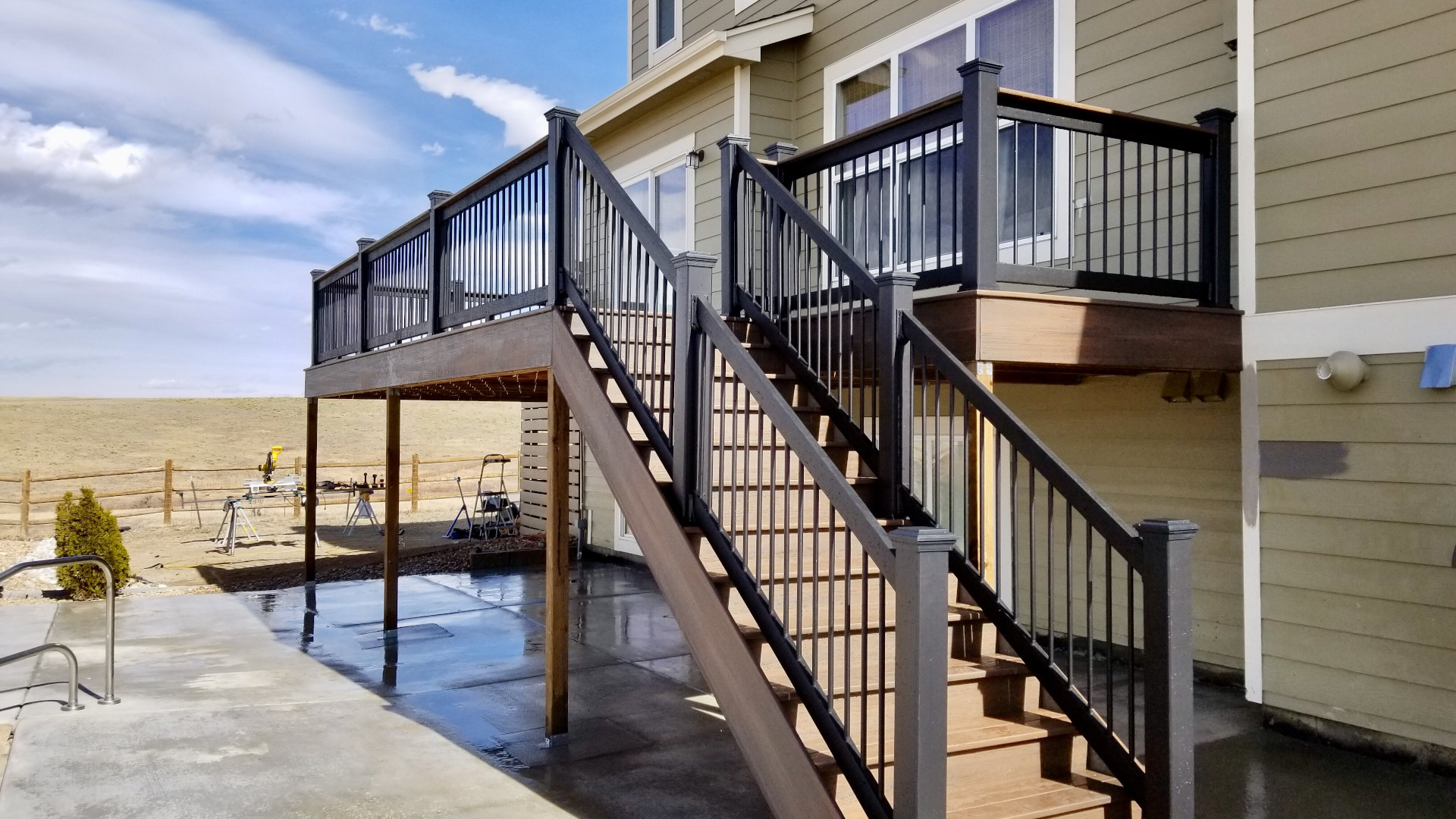 Custom patio and outdoor living area built by LNK Deck & Remodels